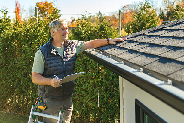 Professional Roofing technician working in Carleton, MI